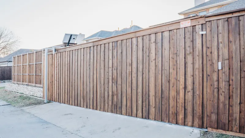 32' Sliding Gate Installation In Carrollton, Texas — Texas Select Fencing, fence company serving Carrollton, Texas