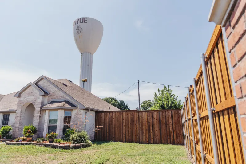 8' Cedar Fence Installation in Wylie, TX — Texas Select Fencing, fence company serving Wylie, Texas