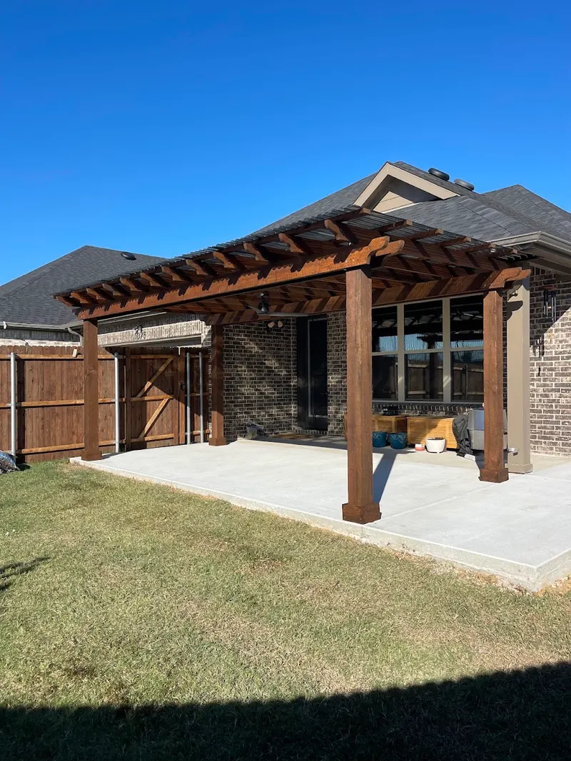 Stained Pergola with Polycarbonate Roof in Gunter, Texas