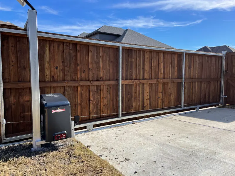 Solar Powered Sliding Driveway Gate Frisco — Texas Select Fencing, fence company serving Frisco, Texas