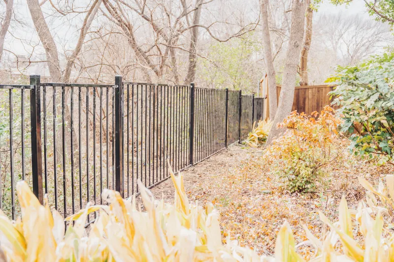 Wood & Wrought Iron Fence Installation In Dallas, Texas