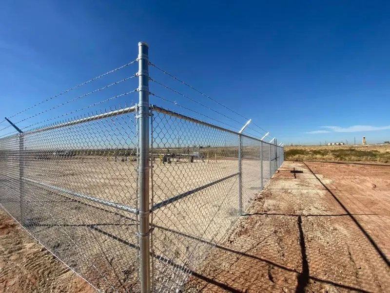 Chain Link Oilfield Fence Installation — Texas Select Fencing, fence company serving Anton, Texas